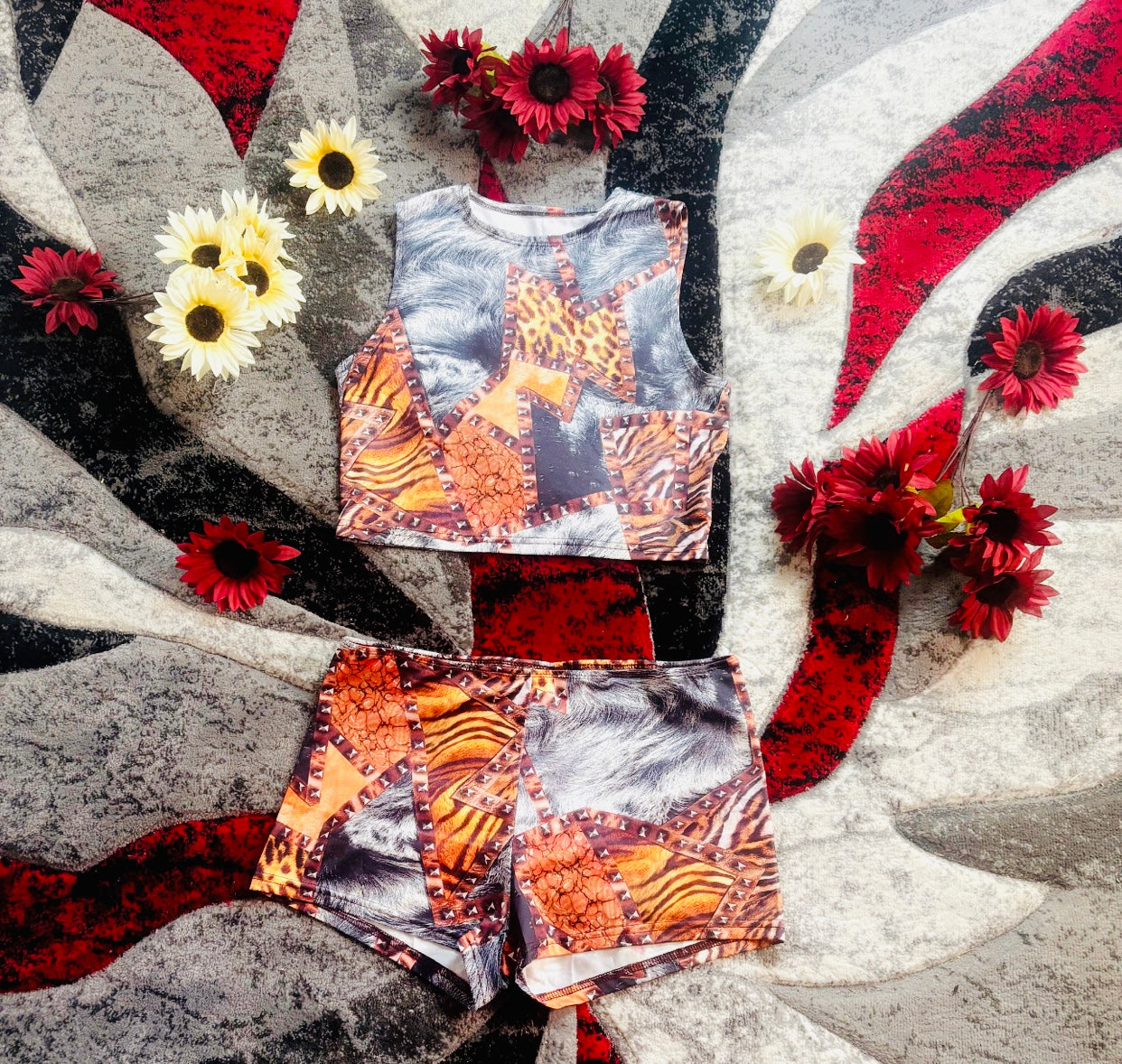 Two-piece Leopard Print sleeveless crop top & shorts set on a textured background with flowers